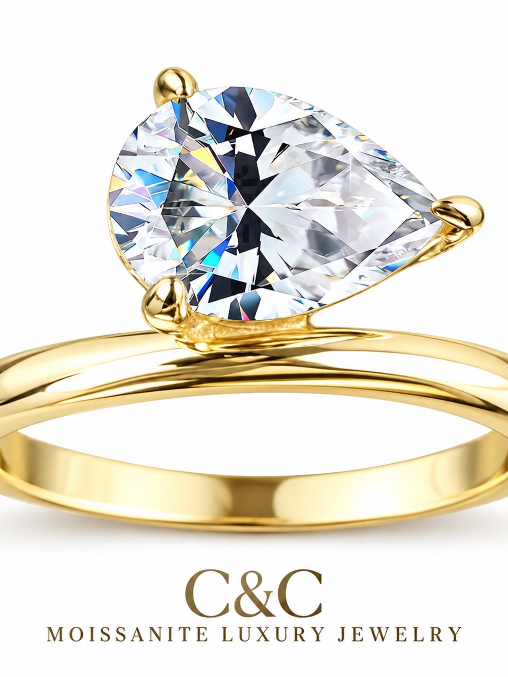 C.C Gold Ring with Pear-Cut Clear Stone